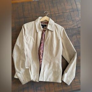 Women’s Tan leather jacket.